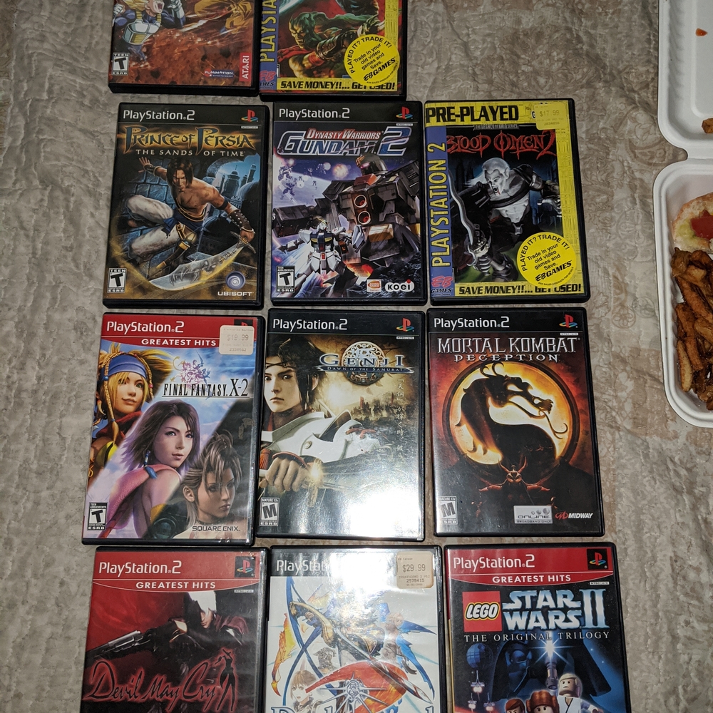 Sony Red and Black PlayStation 2 Video Game Collection